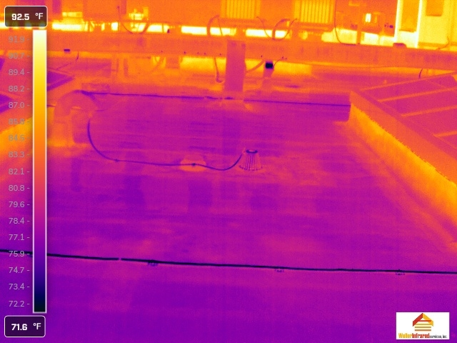 Infrared thermal survey of flat roof showing temperature variations